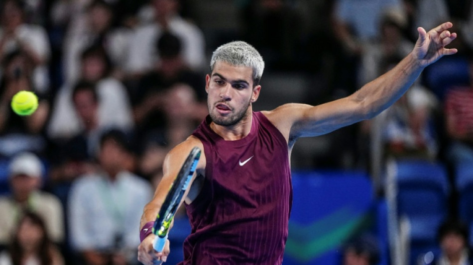 Alcaraz dispels injury fears to reach Tokyo quarter-finals