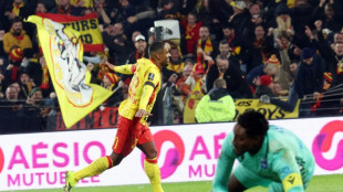 Lens hold off Auxerre to retake top spot from PSG, Marseille win