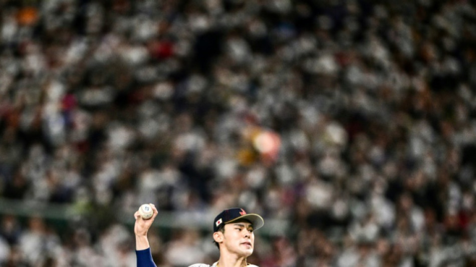 Sasaki leads Japan to baseball win on disaster anniversary