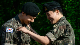 Two more BTS megastars released from South Korea military service 