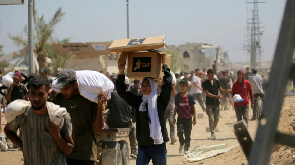 Food airdropped into Gaza as Israel says opening aid routes