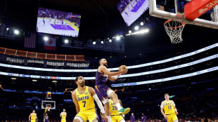 Suns eclipse shoddy Lakers, Mavs upset Nuggets