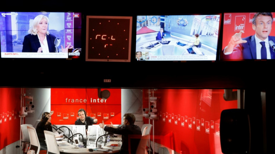 Pr&eacute;sidentielle J-4: la bataille se durcit entre Macron et Le Pen