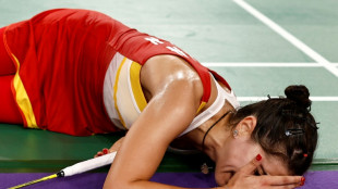Distraught Marin retires from Olympic badminton semi-final after knee injury