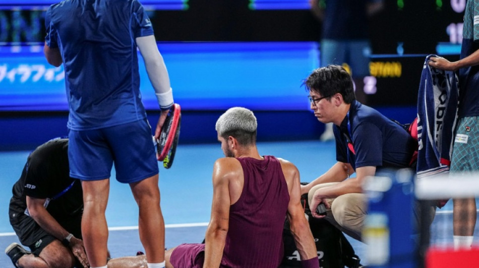 Alcaraz survives injury scare and rain delay to win Tokyo opener