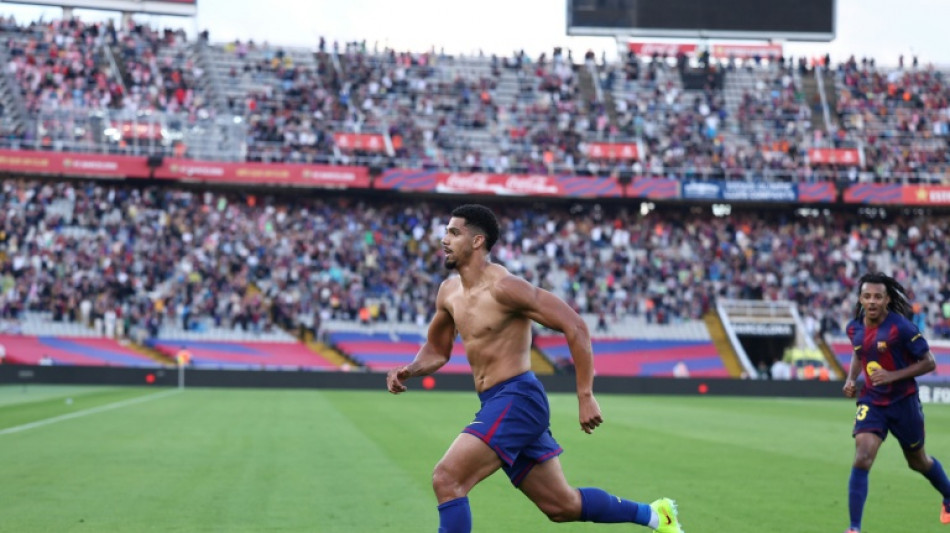 Barca claim Liga lead, Atletico rise to fourth