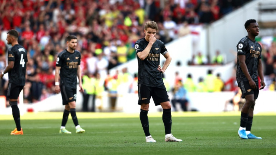 Arsenal defeat hands Man City Premier League title