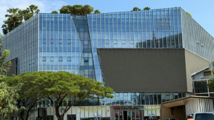 Cambodia to liquidate bank founded by accused scam boss