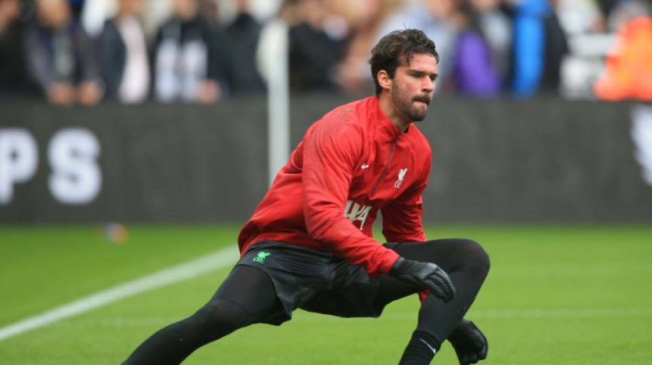 Liverpool's Alisson and Jota face spell on sidelines