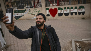 El emotivo regreso del fot&oacute;grafo de AFP Sameer al-Doumy a su ciudad siria