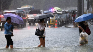Philippines flooding displaces thousands, two missing