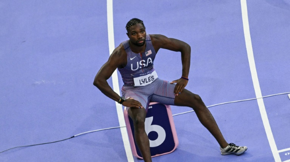 Lyles cruises into Olympic 200m semi-final in treble gold bid