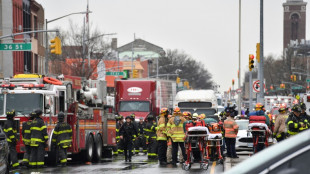 Un homme portant un masque &agrave; gaz tire dans le m&eacute;tro de New York, 17 bless&eacute;s