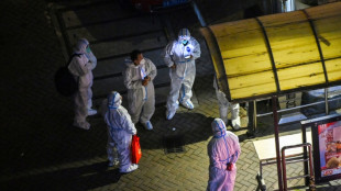 Chine: des &eacute;tudiants confin&eacute;s manifestent, le z&eacute;ro Covid encore assoupli