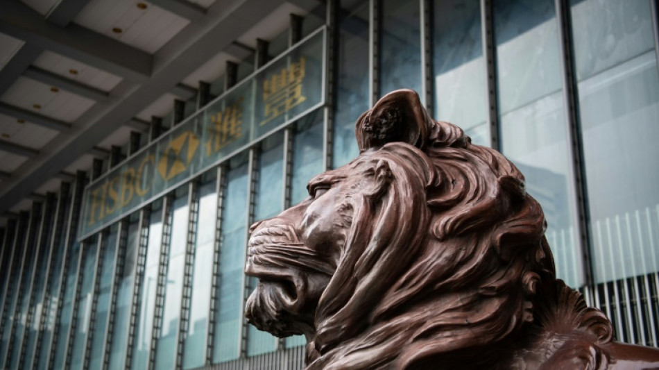 HSBC profit falls in third quarter, hit by legal woes