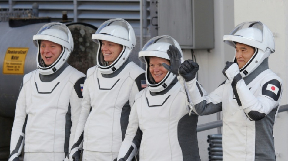 Four astronauts leave space station for trip back to Earth