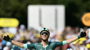 Milan wins baking Tour de France eighth stage in mass sprint