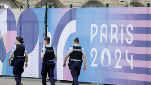 Central Paris locks down for Olympics as athletes arrive