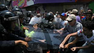 Venezuela police clash with protesters demanding salary rises