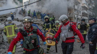 Russia pummels Kyiv, killing at least 21 and denting peace hopes
