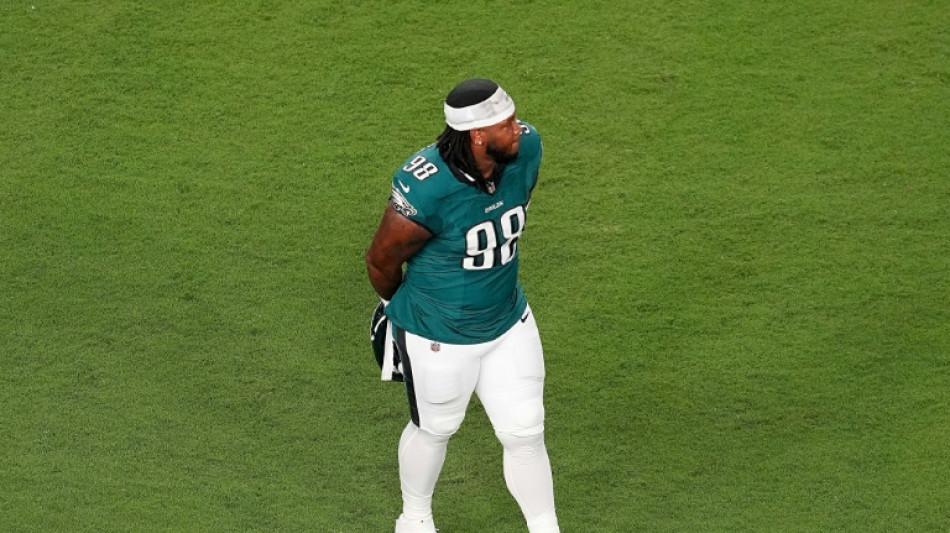 Eagles' Carter tossed from NFL opener for spitting on Cowboys' Prescott