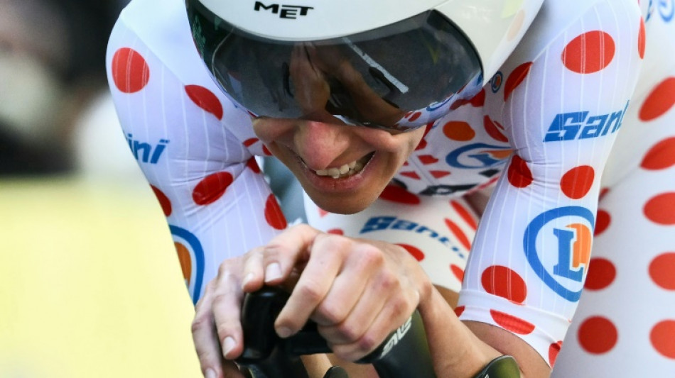Pogacar plays down yellow jersey after Evenepoel wins Tour time trial
