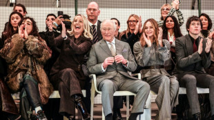 UK king opens London fashion week despite brother's arrest