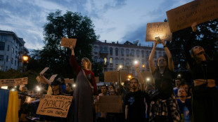 Ukraine curbs anti-corruption agencies, sparking rare protests