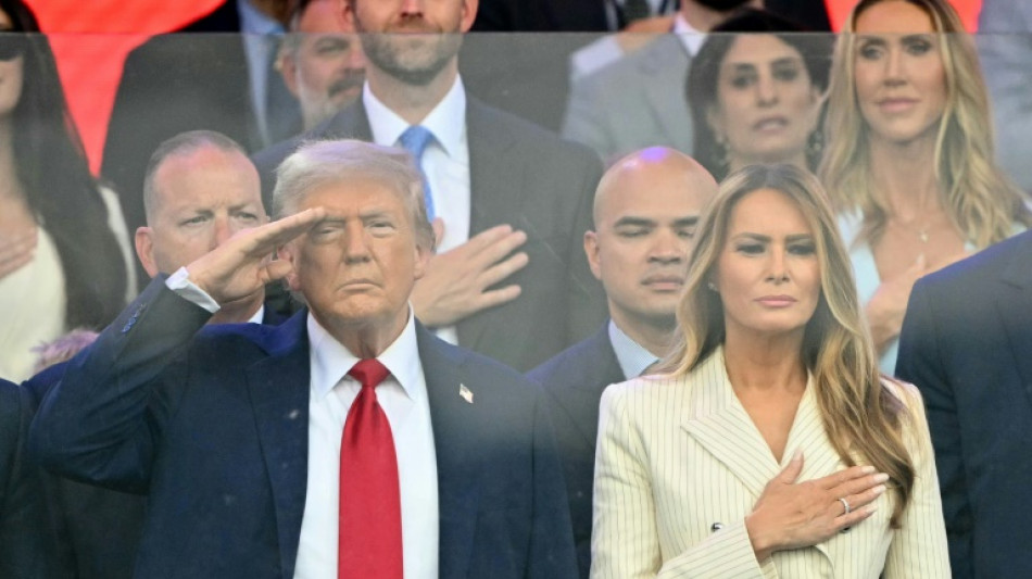 Trump's military parade kicks off as protests sweep US