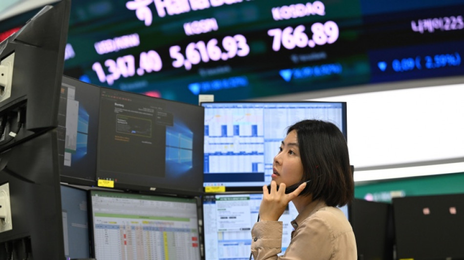 US stocks end higher as AI shares stabilize 
