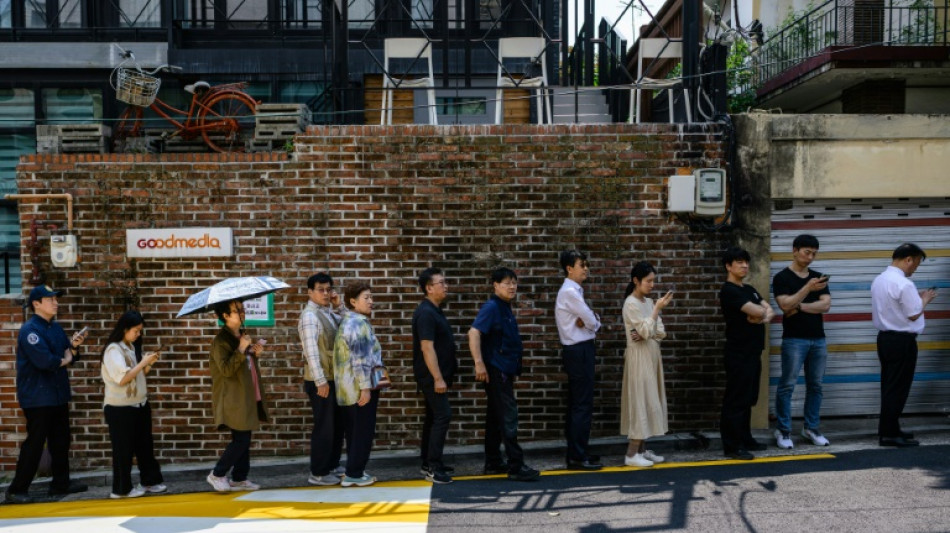 South Koreans vote early in record numbers in poll triggered by martial law