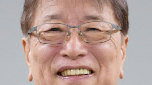 'Stealth husband' of Japan's new PM vows quiet support