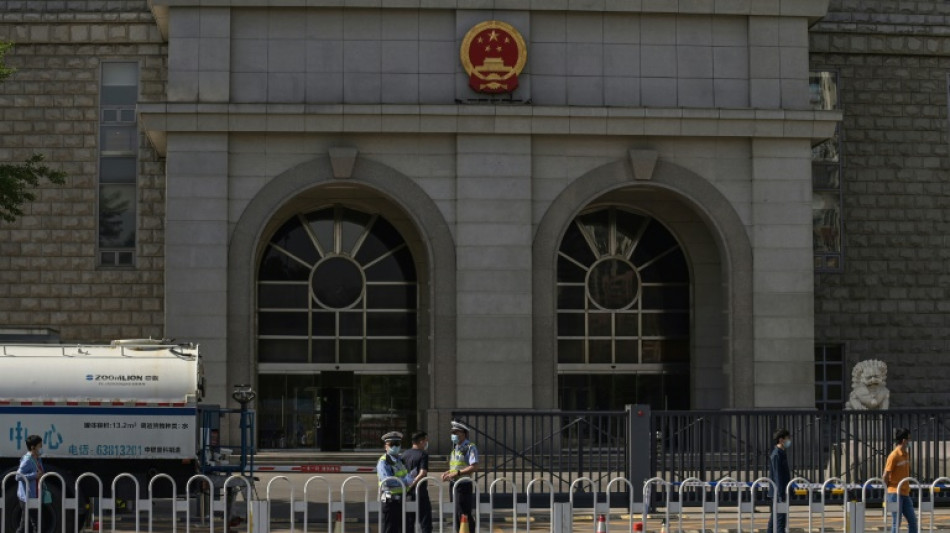 China says Australian writer given suspended death sentence