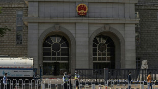 China says Australian writer given suspended death sentence