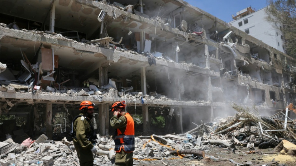 Tehran hit by Israeli attacks, vows response to US strikes