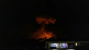 Blasts sow panic in Burundi's main city after arsenal fire