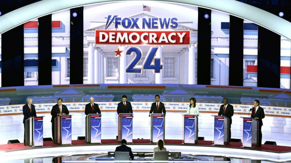 Aus&ecirc;ncia de Trump rouba a cena em debate republicano tenso