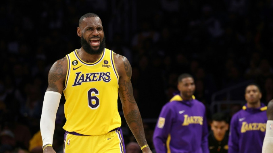 James leads Lakers into playoffs after thriller, Hawks advance