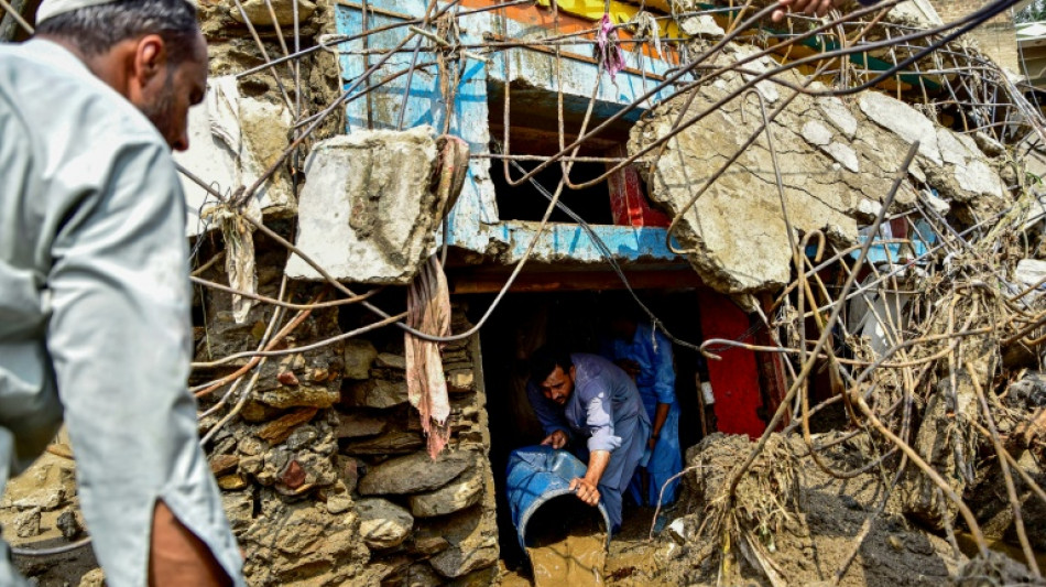 Pakistan rescuers recover bodies after monsoon rains kill 340